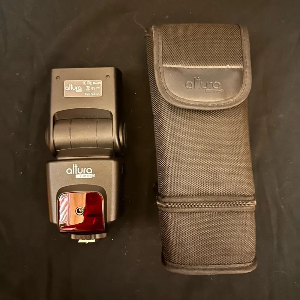 ALTURA PHOTO FLASH with flash triggered remote.